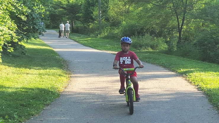 Learn to Ride student enjoying his first bicycle ride! 